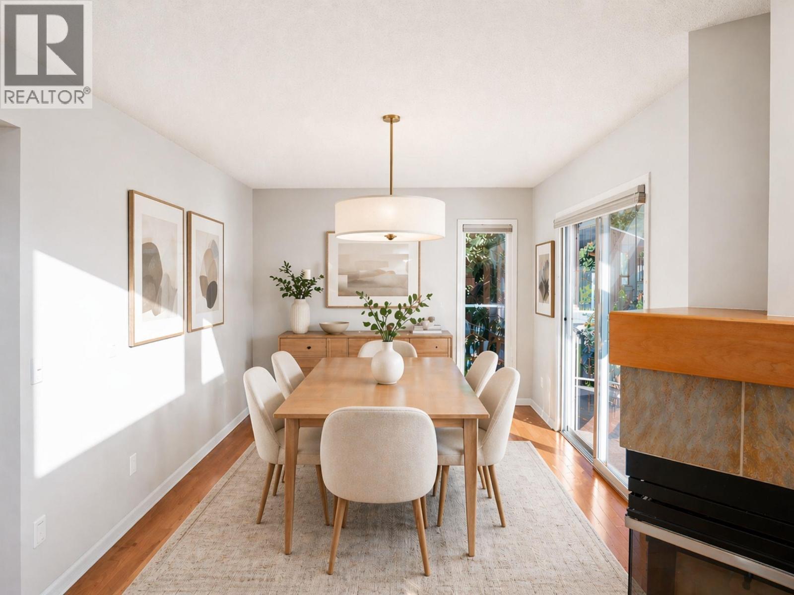 Virtually staged Dining Room for illustrative purposes. - 1988 Dewdney Road, Kelowna, BC - Indoor Photo Showing Dining Room