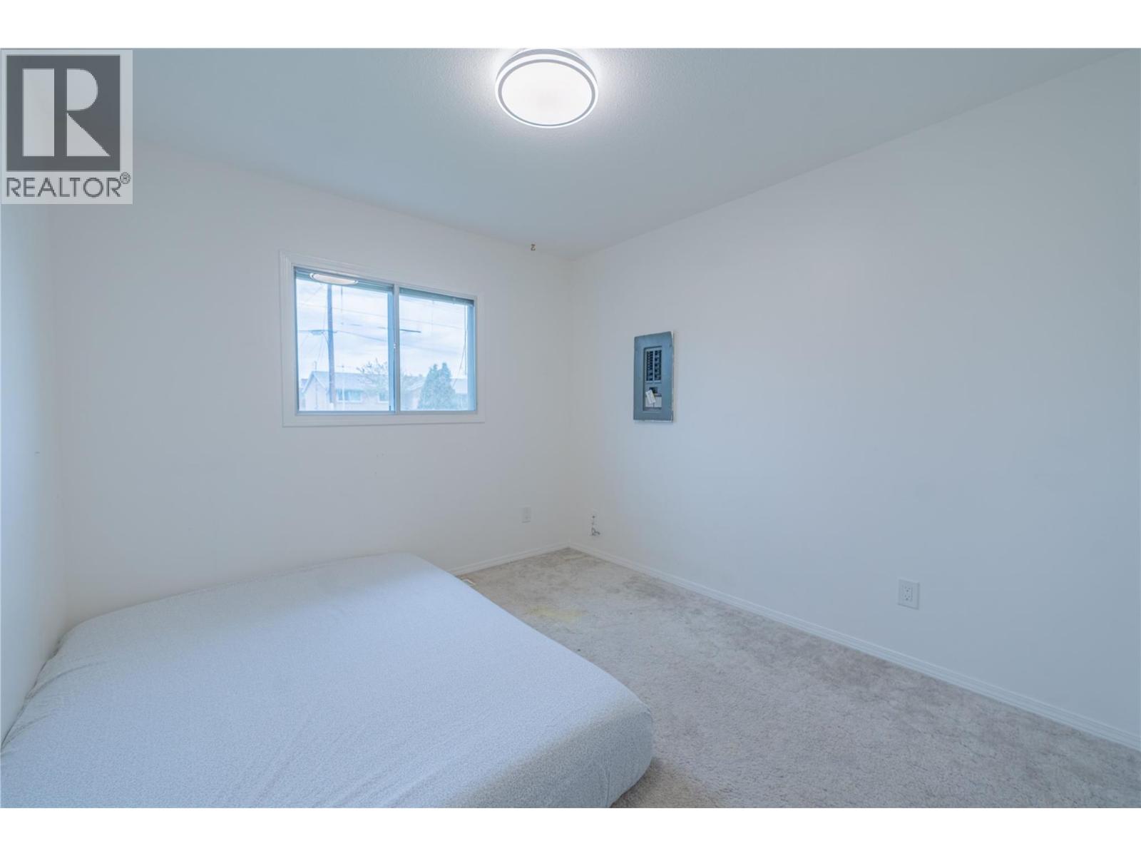151 Molnar Road, Kelowna, BC - Indoor Photo Showing Bedroom