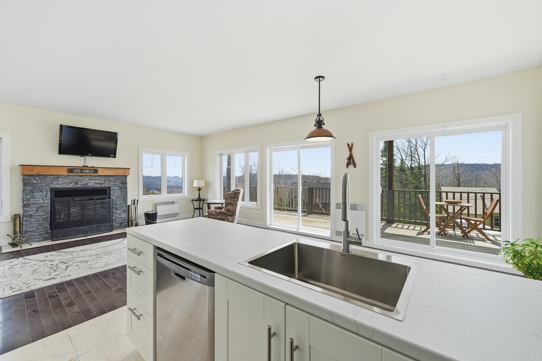 Kitchen - 2713 Rue Du Hameau, Sainte-Adèle, QC - Indoor With Fireplace