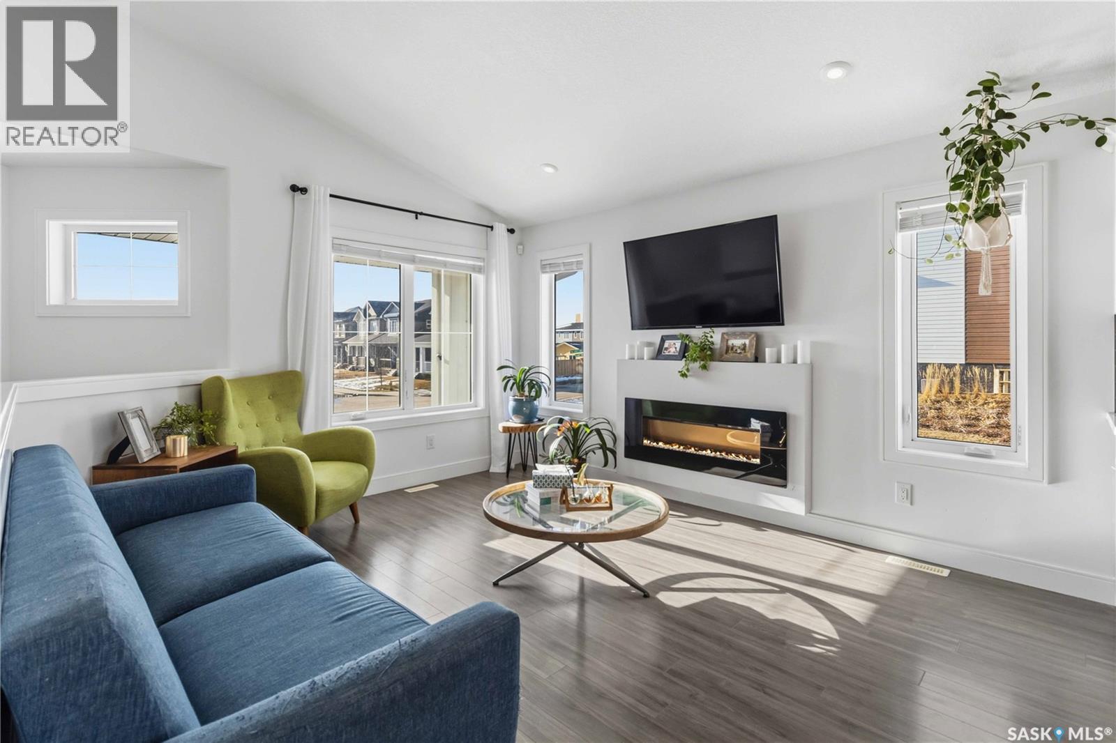 403 Delainey Road, Saskatoon, SK - Indoor Photo Showing Living Room With Fireplace