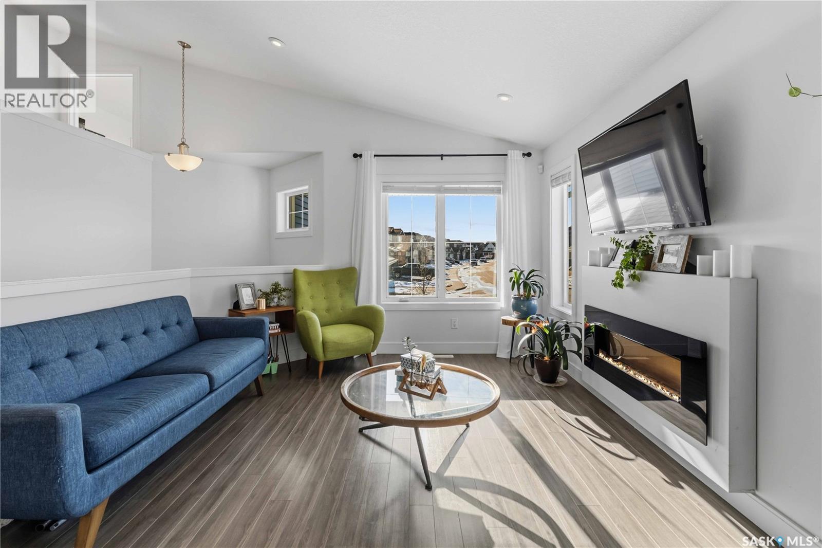 403 Delainey Road, Saskatoon, SK - Indoor Photo Showing Living Room With Fireplace