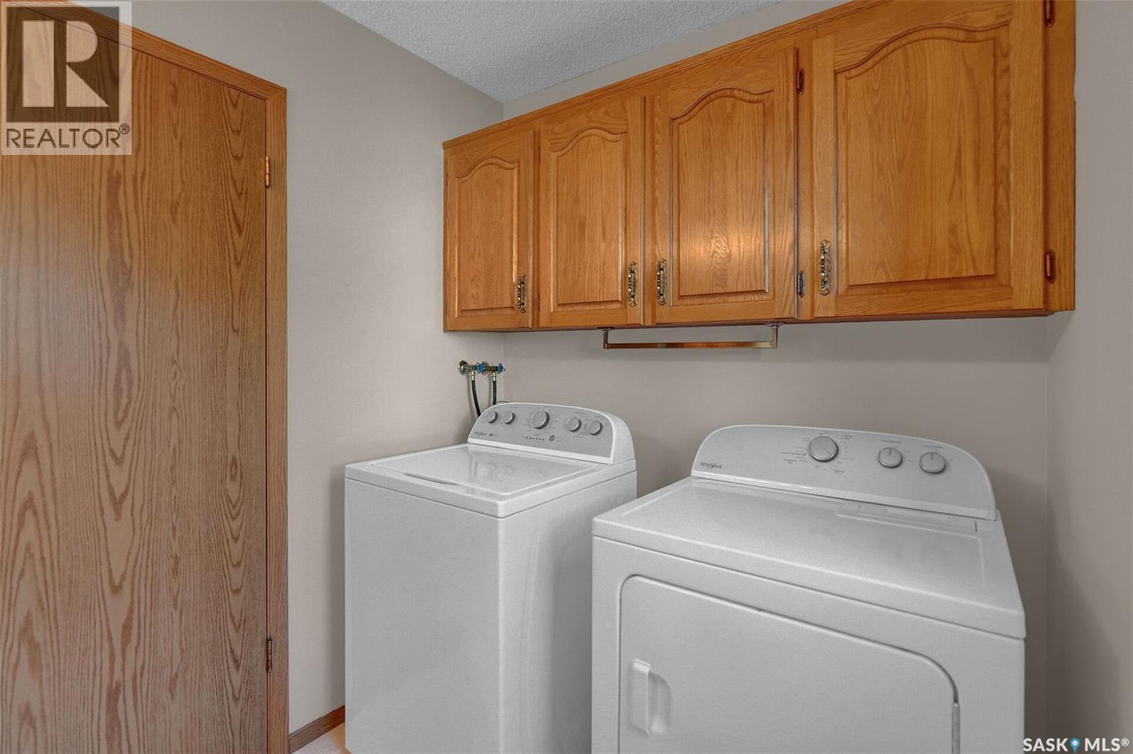 3139 Thacker Bay E, Regina, SK - Indoor Photo Showing Laundry Room