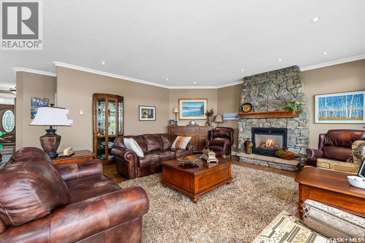 914 Tatanka Drive, Sun Valley, SK - Indoor Photo Showing Living Room With Fireplace