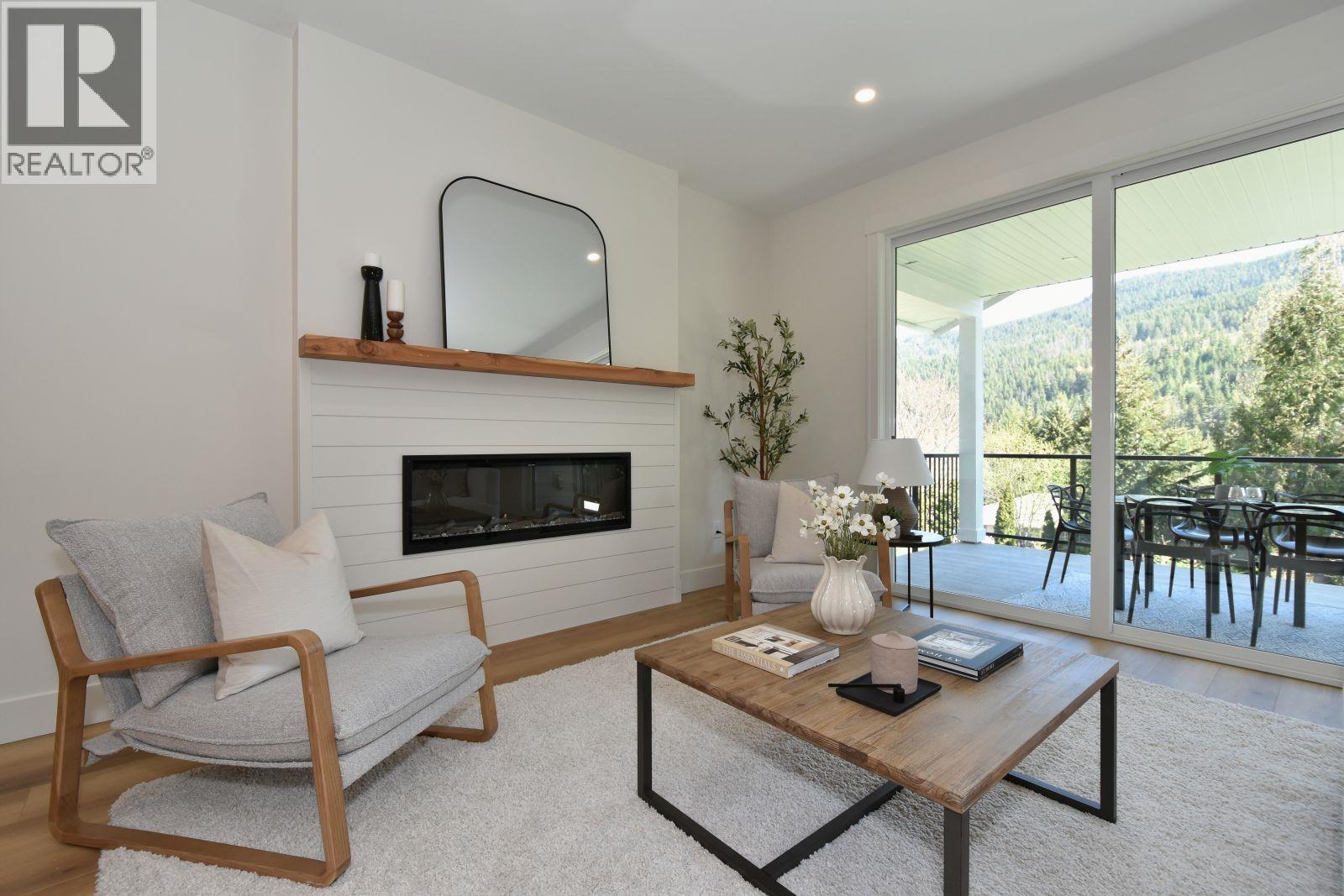 2799 Mountview Drive, Blind Bay, BC - Indoor Photo Showing Living Room With Fireplace