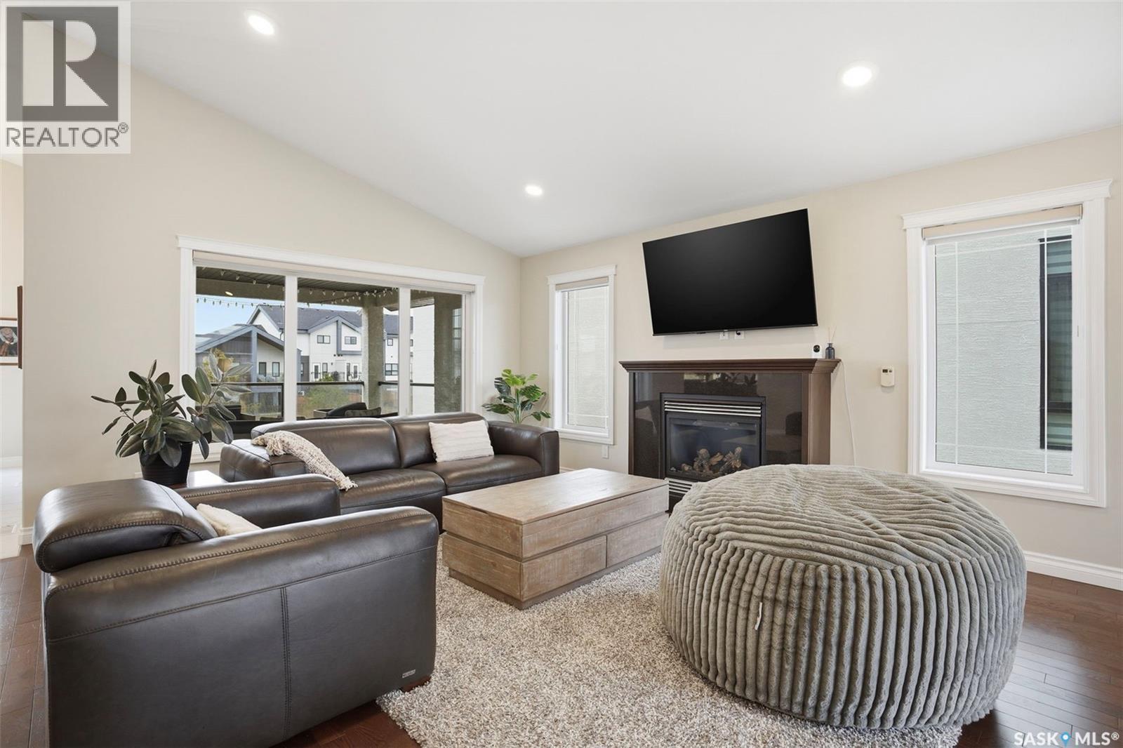 106 Johns Road, Saskatoon, SK - Indoor Photo Showing Living Room With Fireplace