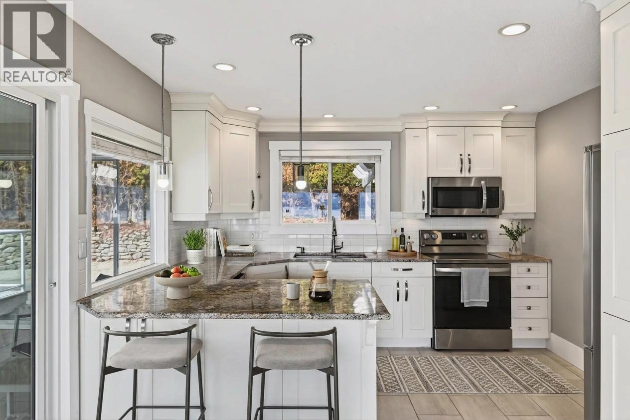 **virtually staged** - 3940 Angus Drive, West Kelowna, BC - Indoor Photo Showing Kitchen With Upgraded Kitchen