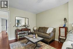 Warmly painted interior with dark wood-finish flooring -