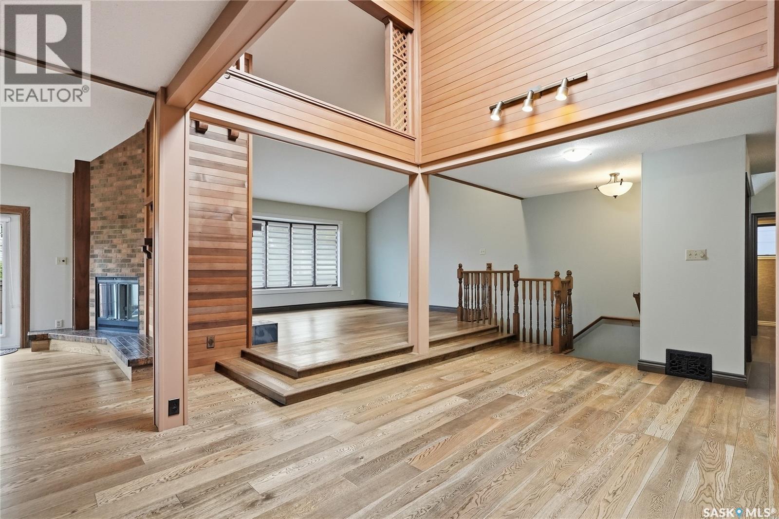622 Costigan Way, Saskatoon, SK - Indoor Photo Showing Other Room With Fireplace