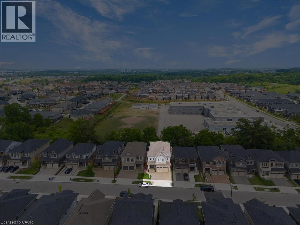 Aerial overview of property's location with nearby suburban area - 49 Scots Pine Trail, Kitchener, ON - Outdoor With View