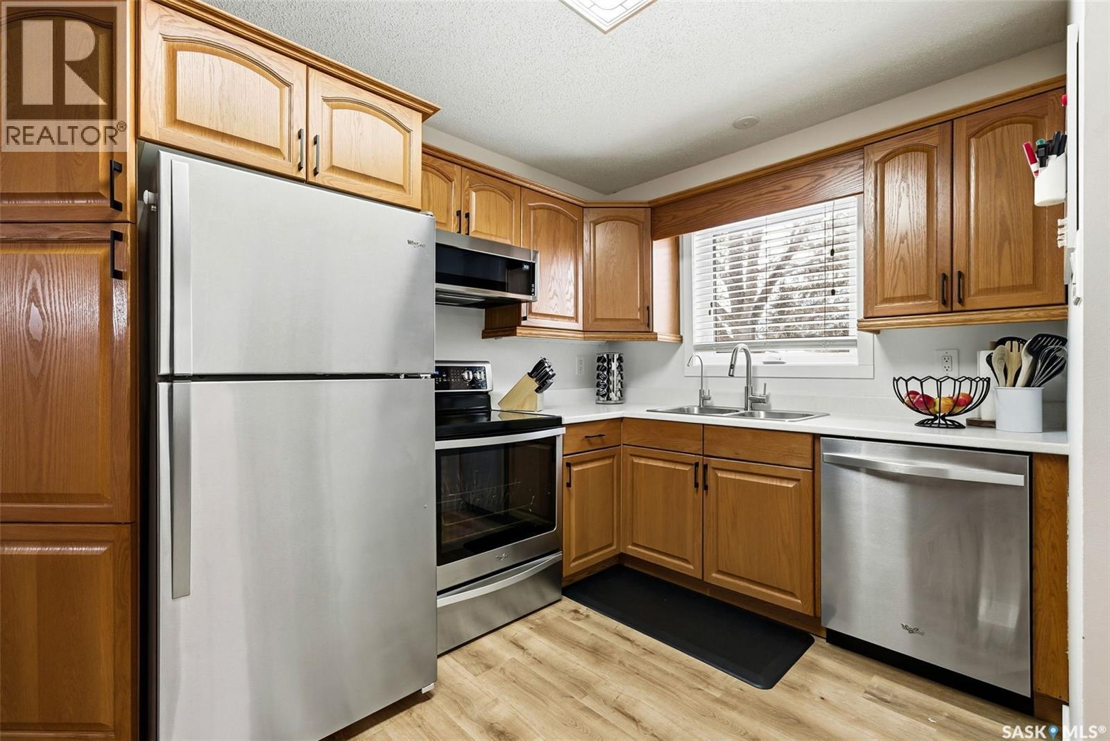 14 Joyce Crescent, Regina, SK - Indoor Photo Showing Kitchen With Stainless Steel Kitchen With Double Sink