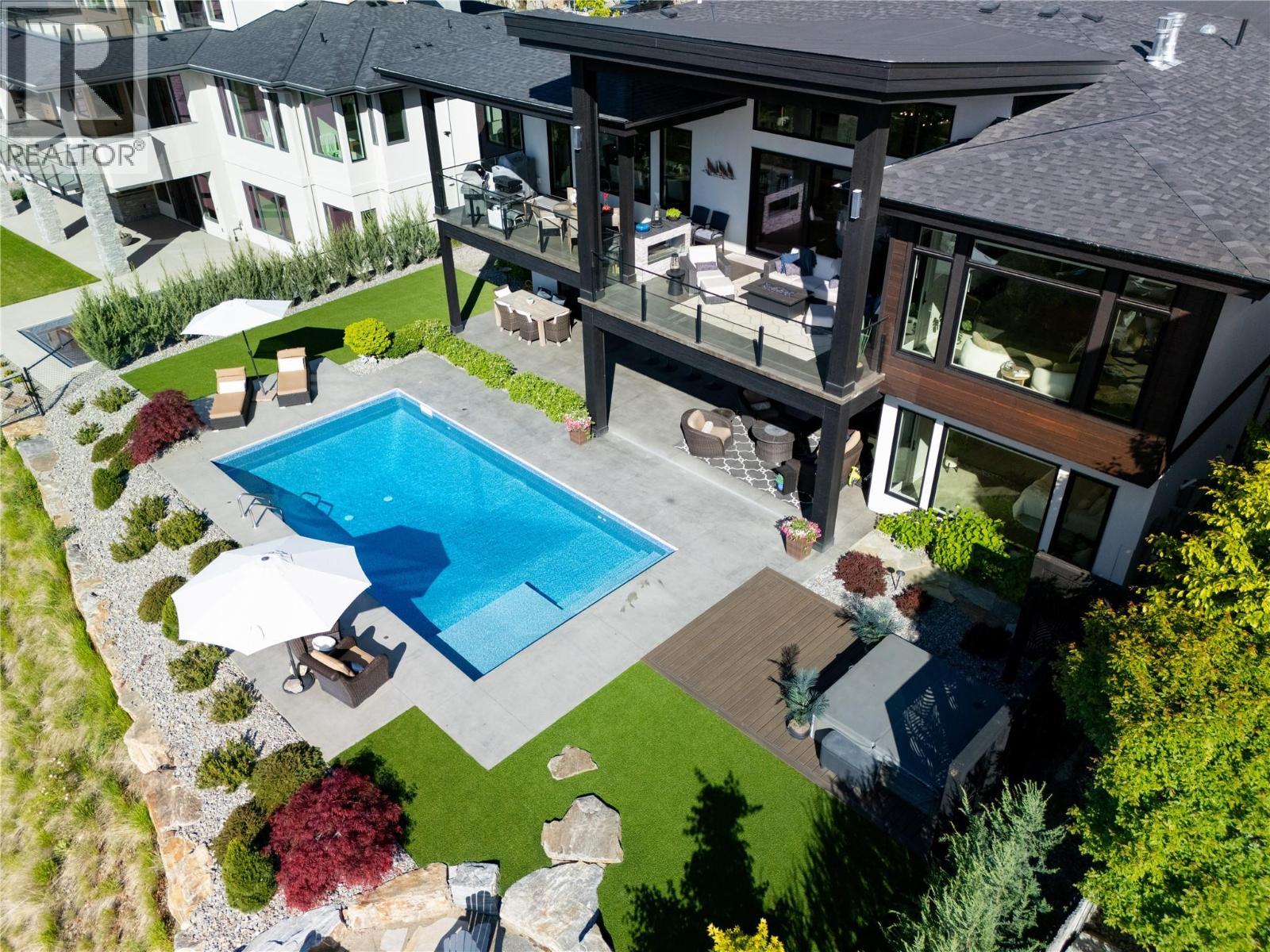 5650 The Edge Place Unit# 111, Kelowna, BC - Outdoor With In Ground Pool With Deck Patio Veranda