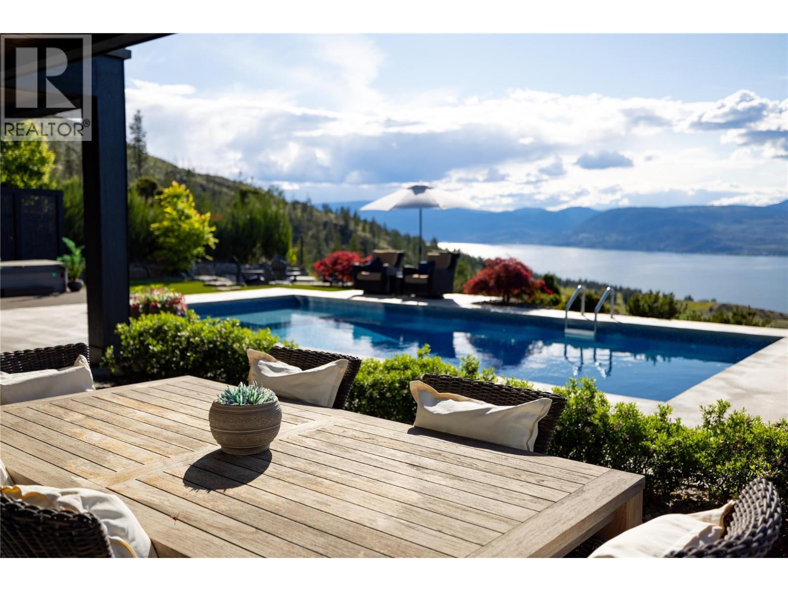 5650 The Edge Place Unit# 111, Kelowna, BC - Outdoor With In Ground Pool With Deck Patio Veranda
