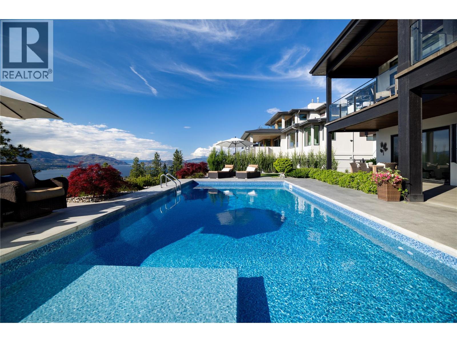 5650 The Edge Place Unit# 111, Kelowna, BC - Outdoor With In Ground Pool