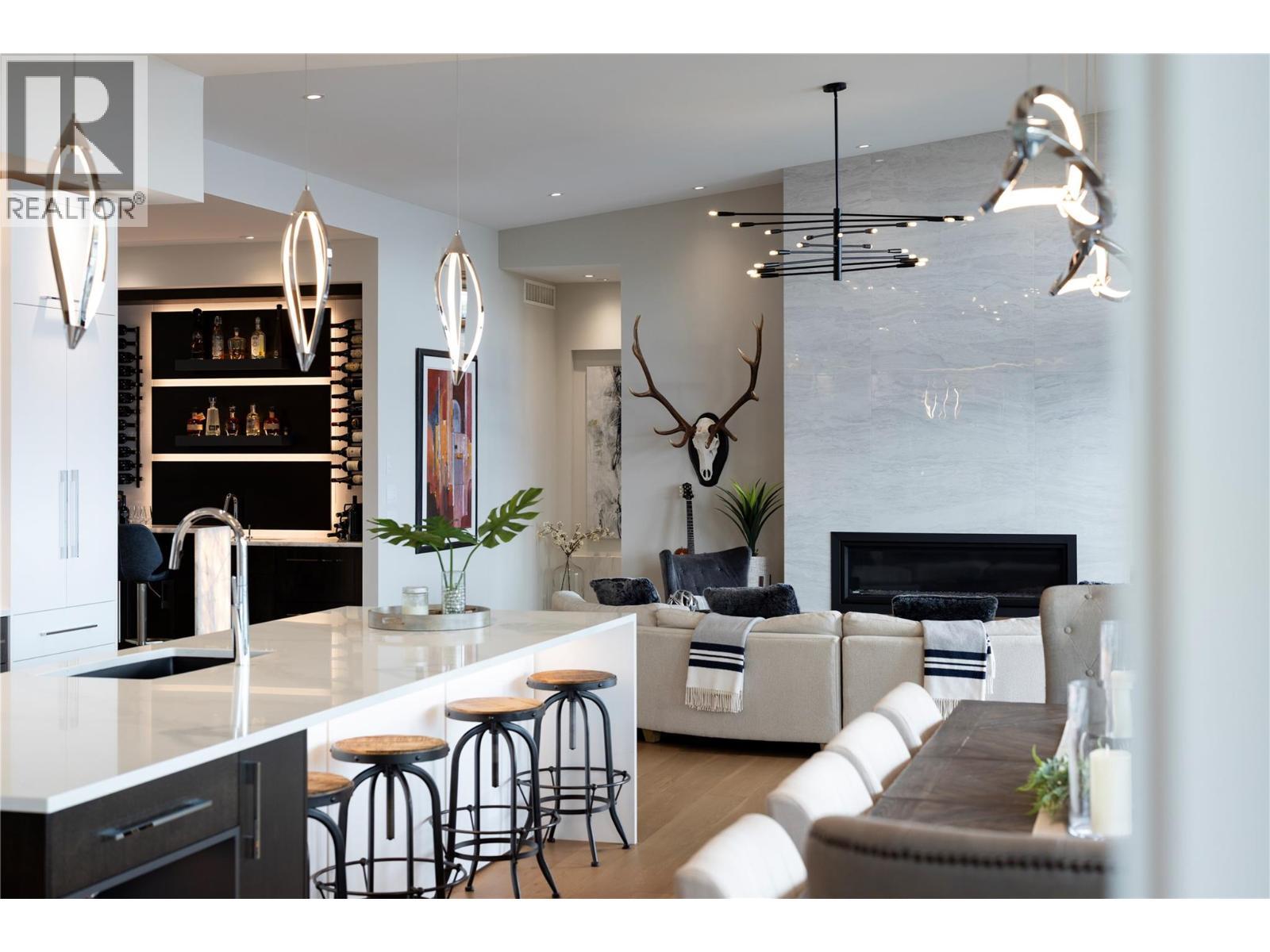 5650 The Edge Place Unit# 111, Kelowna, BC - Indoor With Fireplace