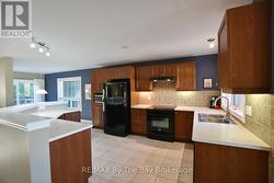 Kitchen with Large Island for Lots of Storage -