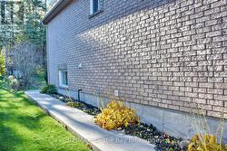 Wrap Around Concrete Walkway to Backyard -