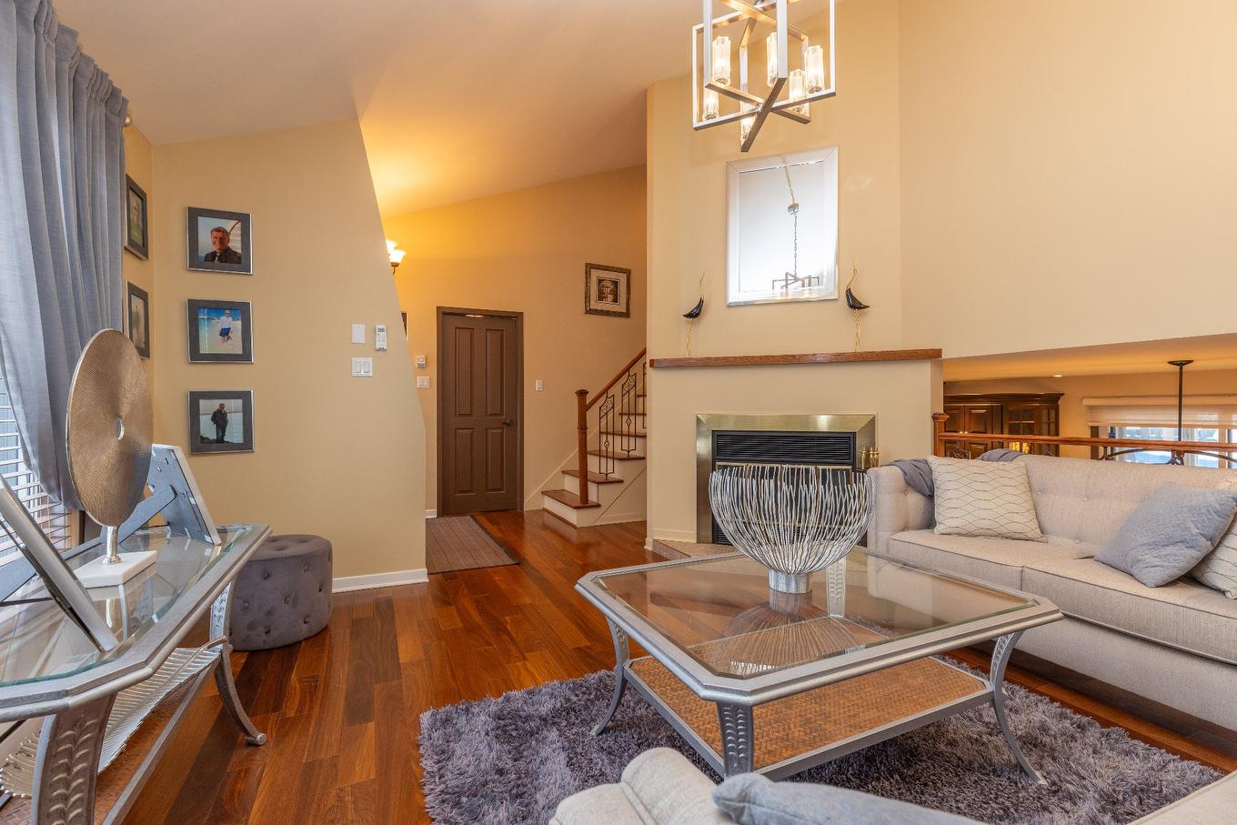 Salon - 275 Rue De Thèbes, Laval (Vimont), QC - Indoor Photo Showing Living Room With Fireplace