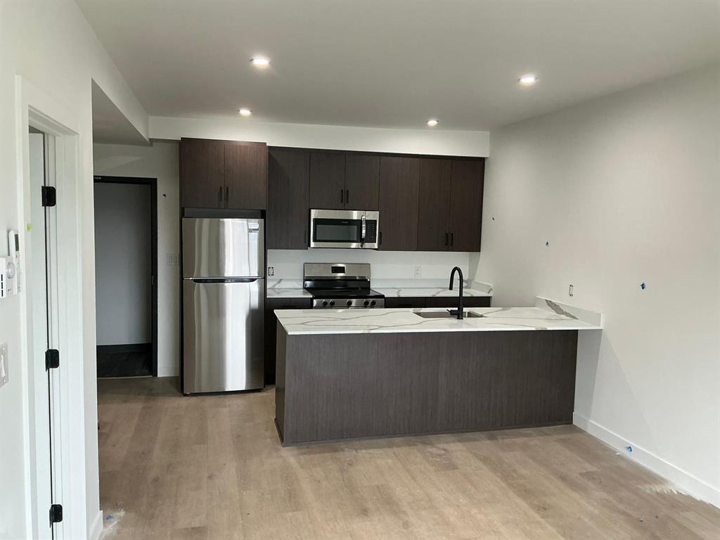 129 5Th Avenue, Swan River, MB - Indoor Photo Showing Kitchen With Stainless Steel Kitchen