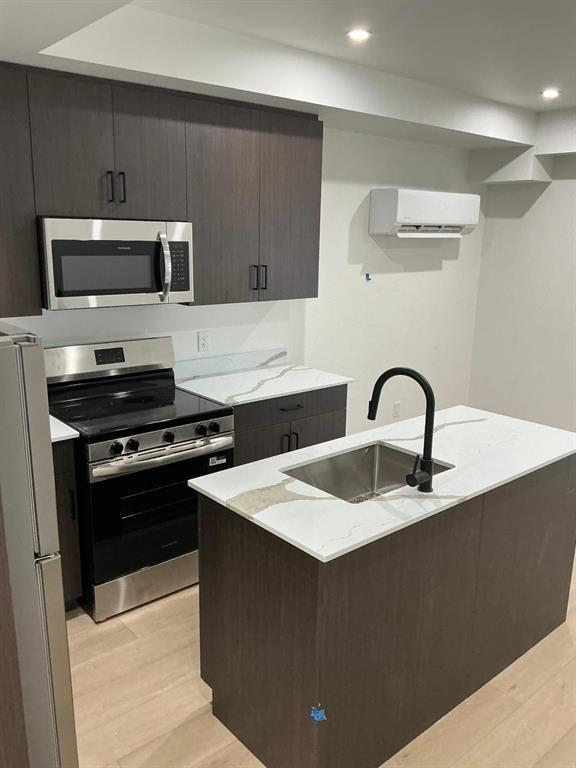 129 5Th Avenue, Swan River, MB - Indoor Photo Showing Kitchen With Double Sink