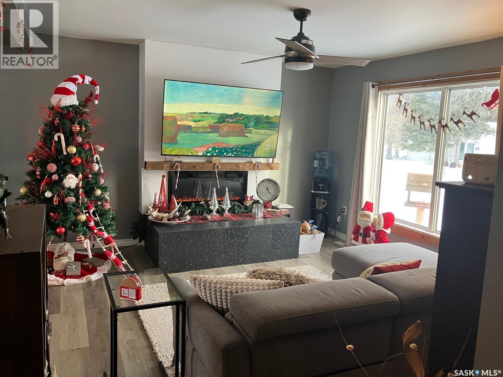 108 2Nd Street E, Smeaton, SK - Indoor Photo Showing Living Room With Fireplace