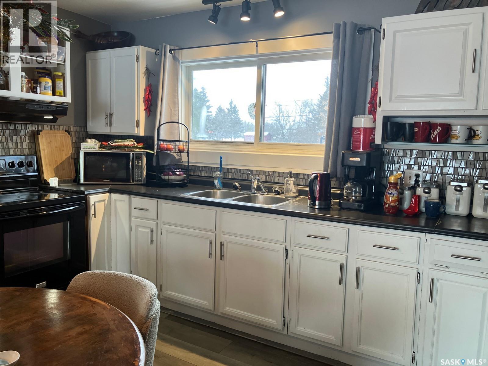 108 2Nd Street E, Smeaton, SK - Indoor Photo Showing Kitchen With Double Sink