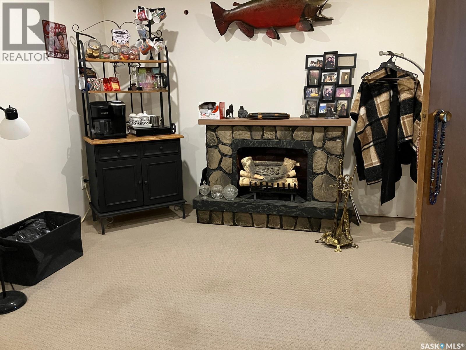 108 2Nd Street E, Smeaton, SK - Indoor With Fireplace