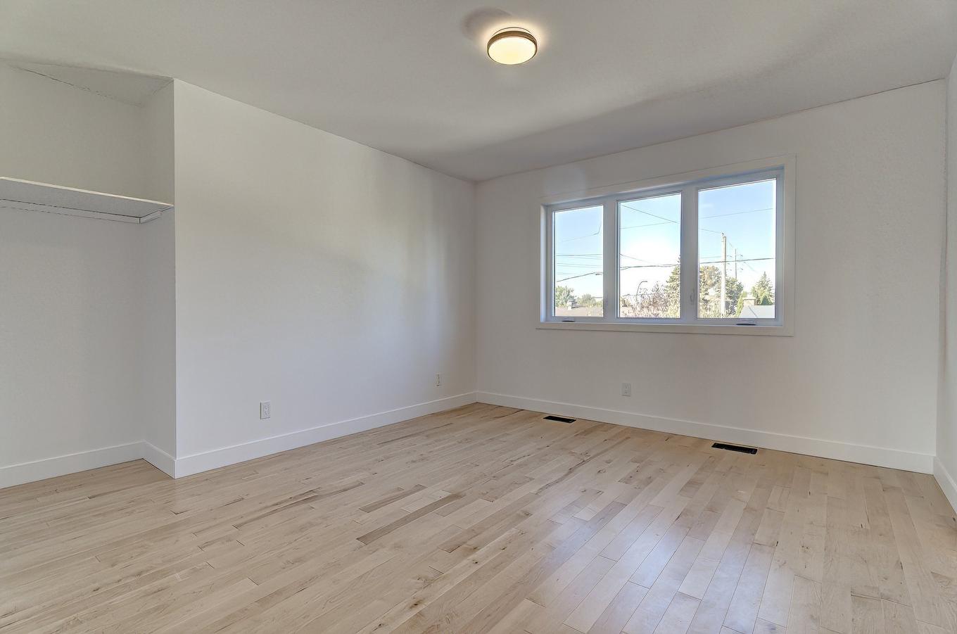 Chambre à coucher principale - 6535 Rue Poitou, Brossard, QC - Indoor Photo Showing Other Room