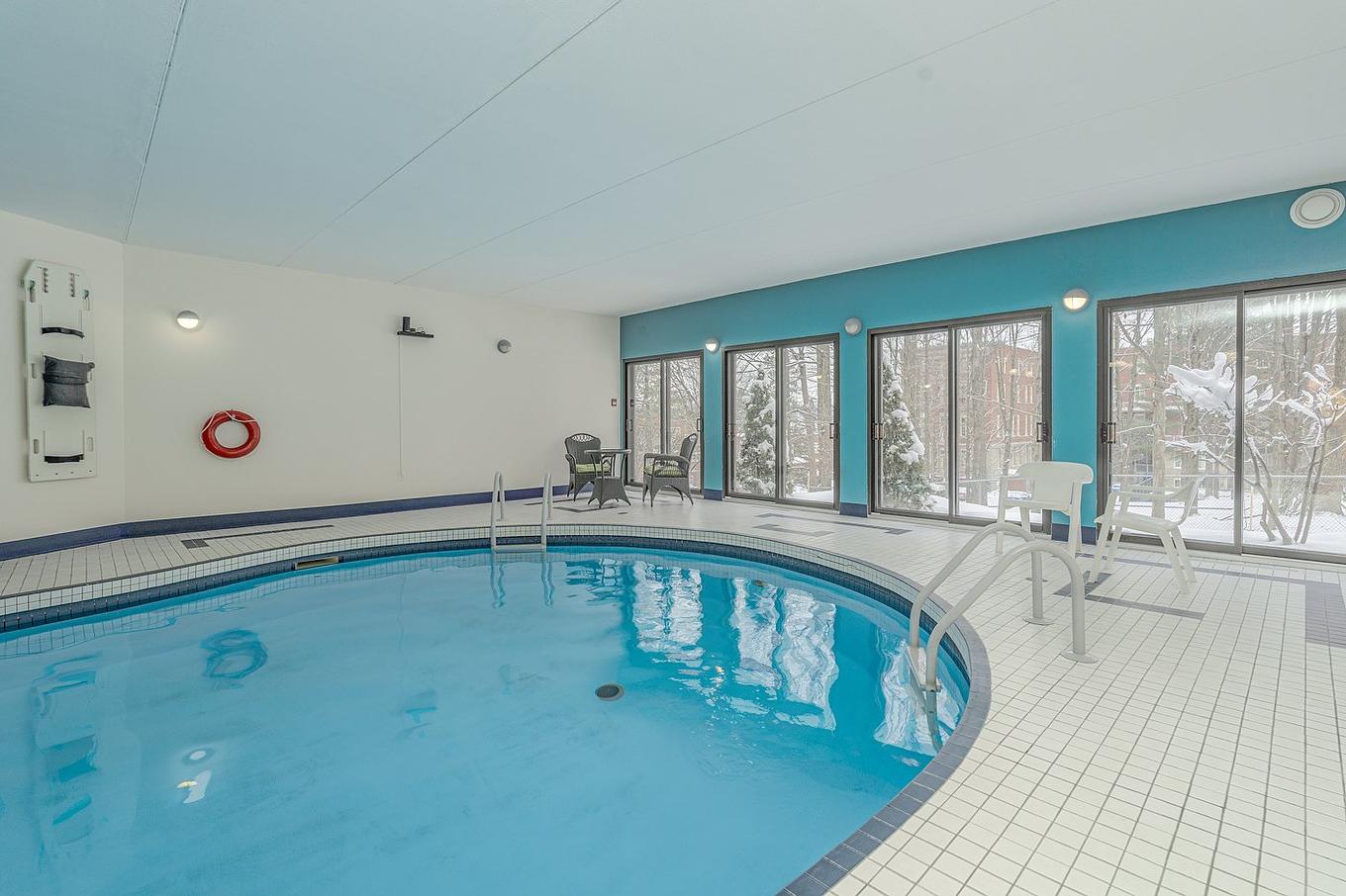 Piscine - 202-800 Rue De Vimy, Sherbrooke (Les Nations), QC - Indoor Photo Showing Other Room With In Ground Pool
