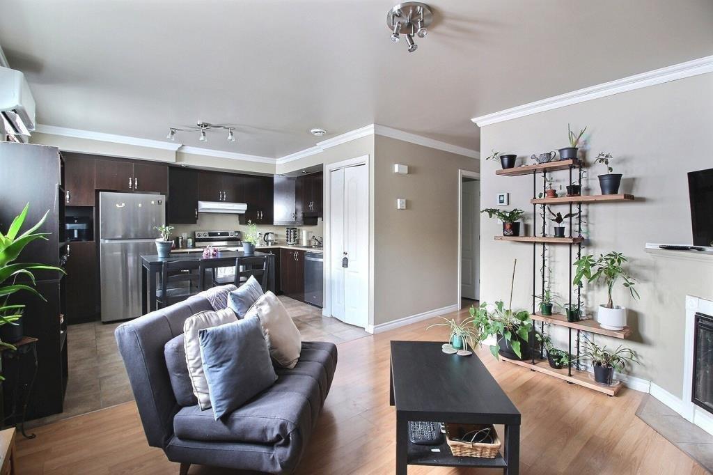Salon - 440 - 446 Boul. St-Charles, Drummondville, QC - Indoor Photo Showing Living Room With Fireplace