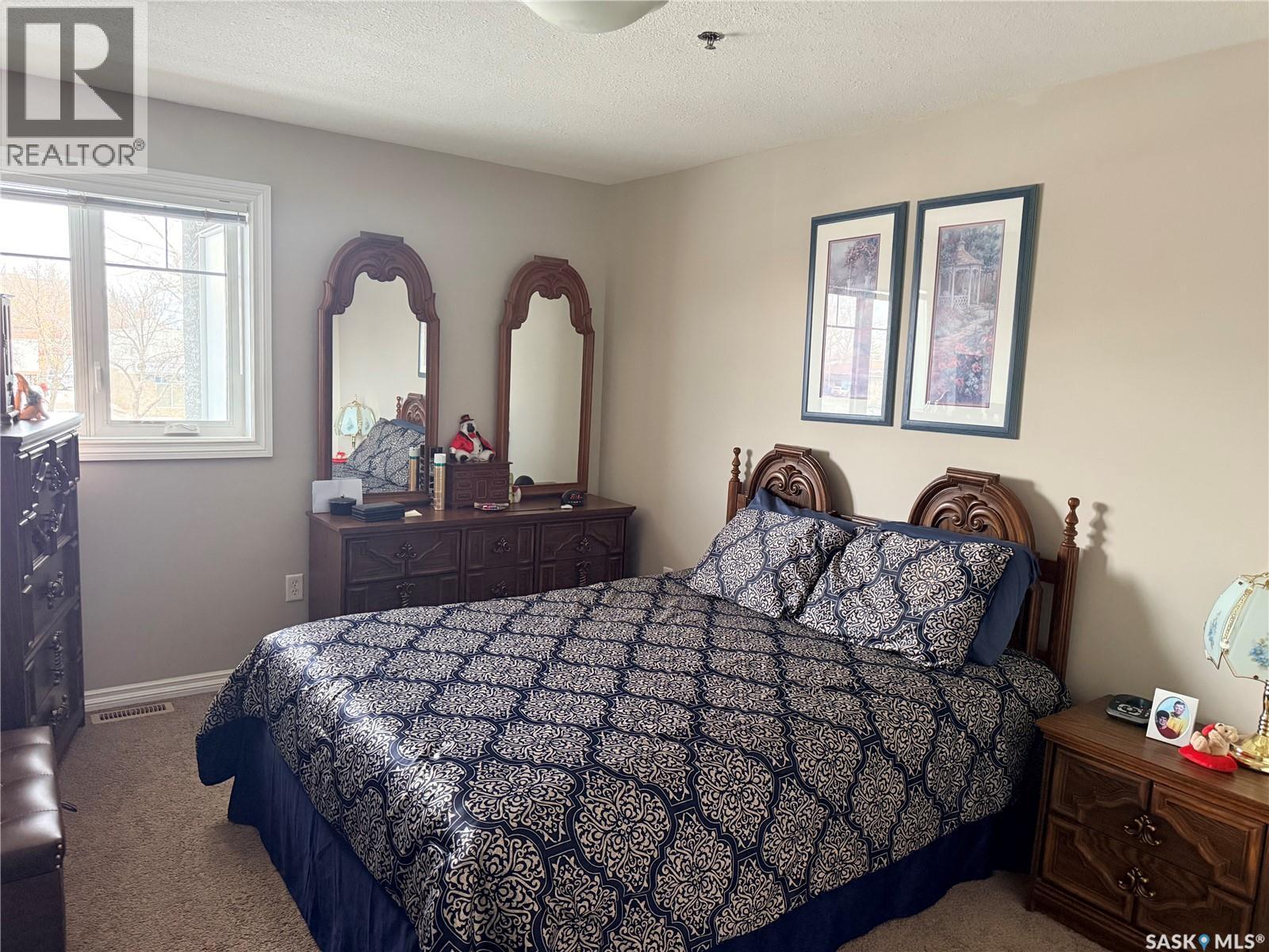 107 6345 Rochdale Boulevard, Regina, SK - Indoor Photo Showing Bedroom