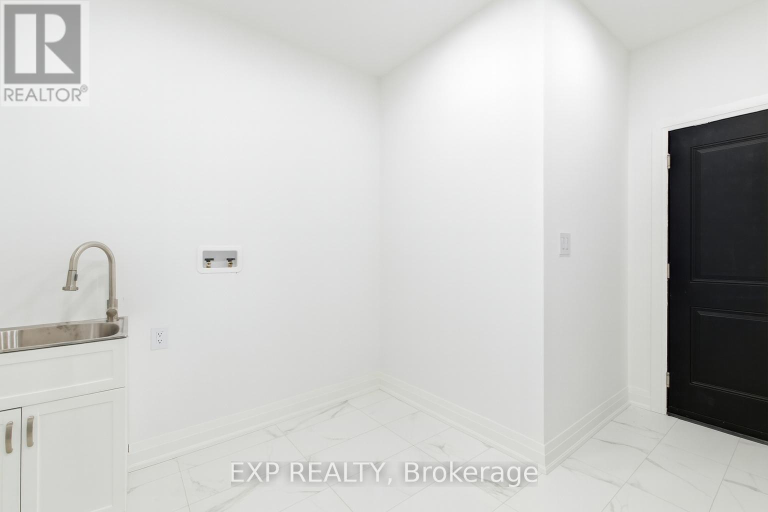 Mudroom w/ combo laundry room, access to garage - 49 Beaufort Crescent, Tiny, ON - Indoor Photo Showing Other Room