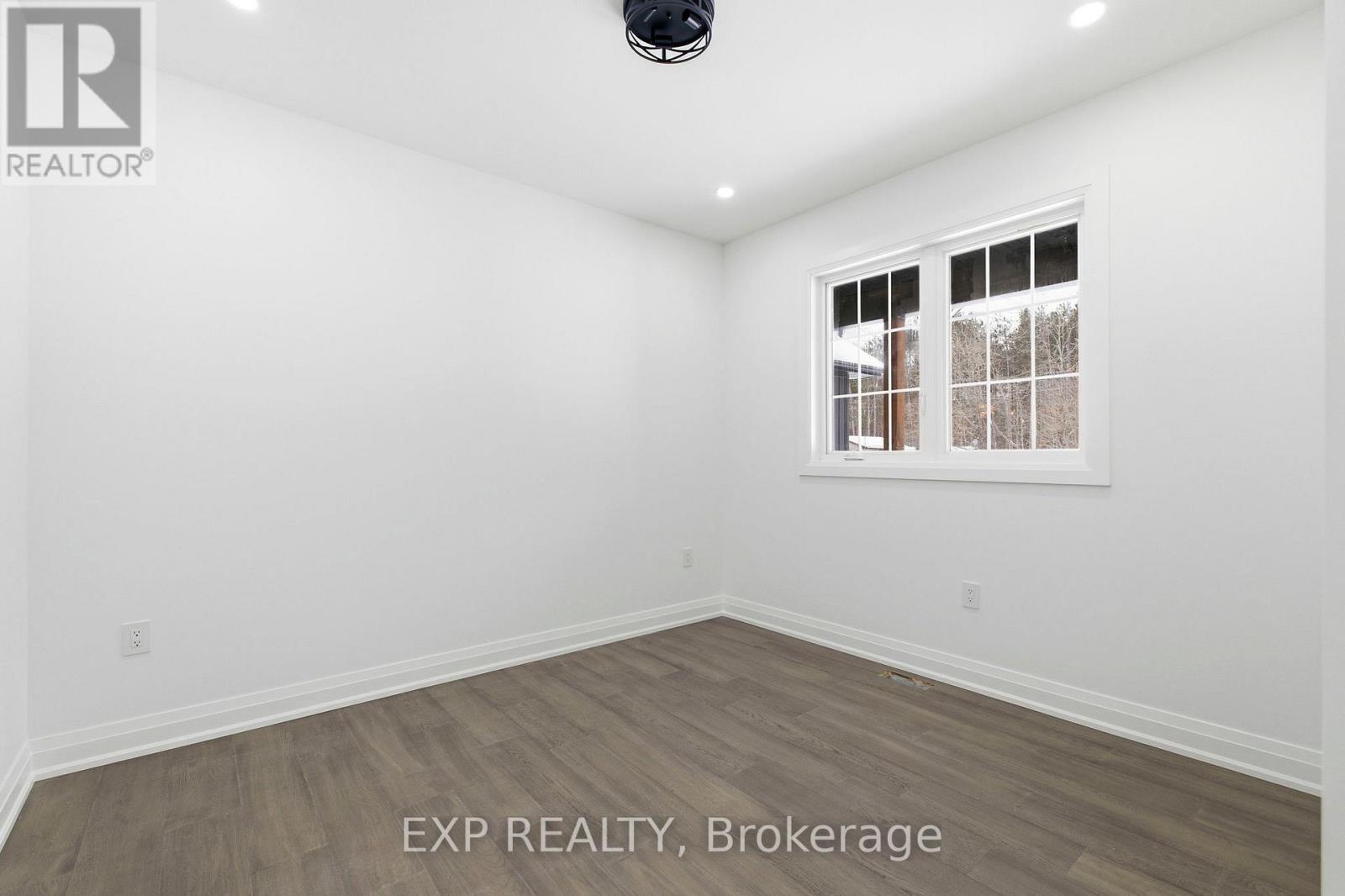 Bedroom 2 - 49 Beaufort Crescent, Tiny, ON - Indoor Photo Showing Other Room