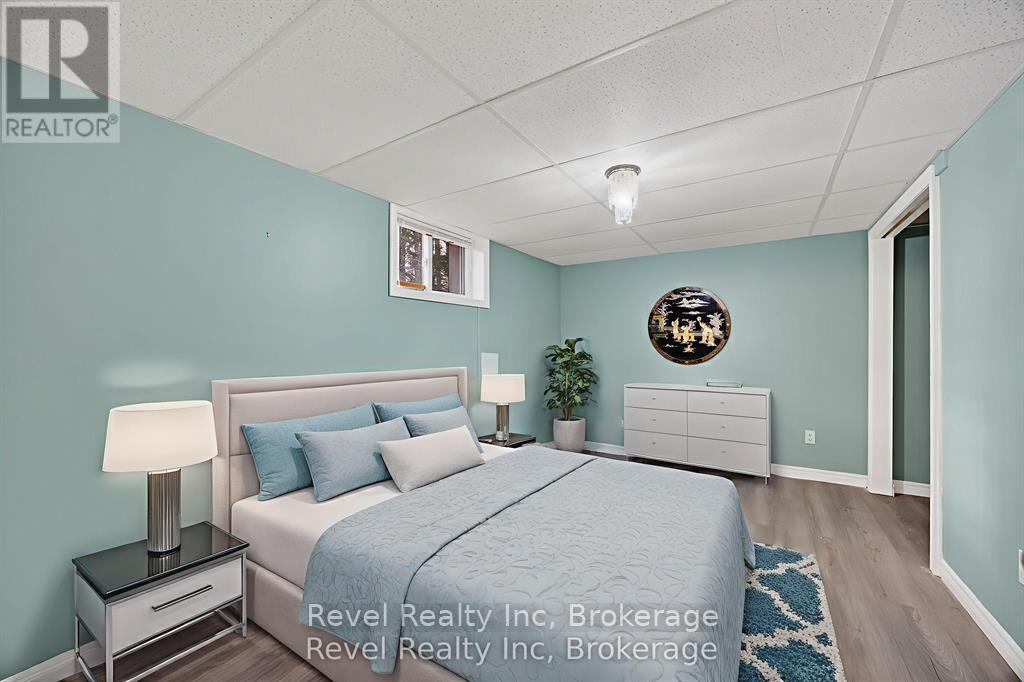 virtually staged - 144 Trout Lane, Tiny, ON - Indoor Photo Showing Bedroom