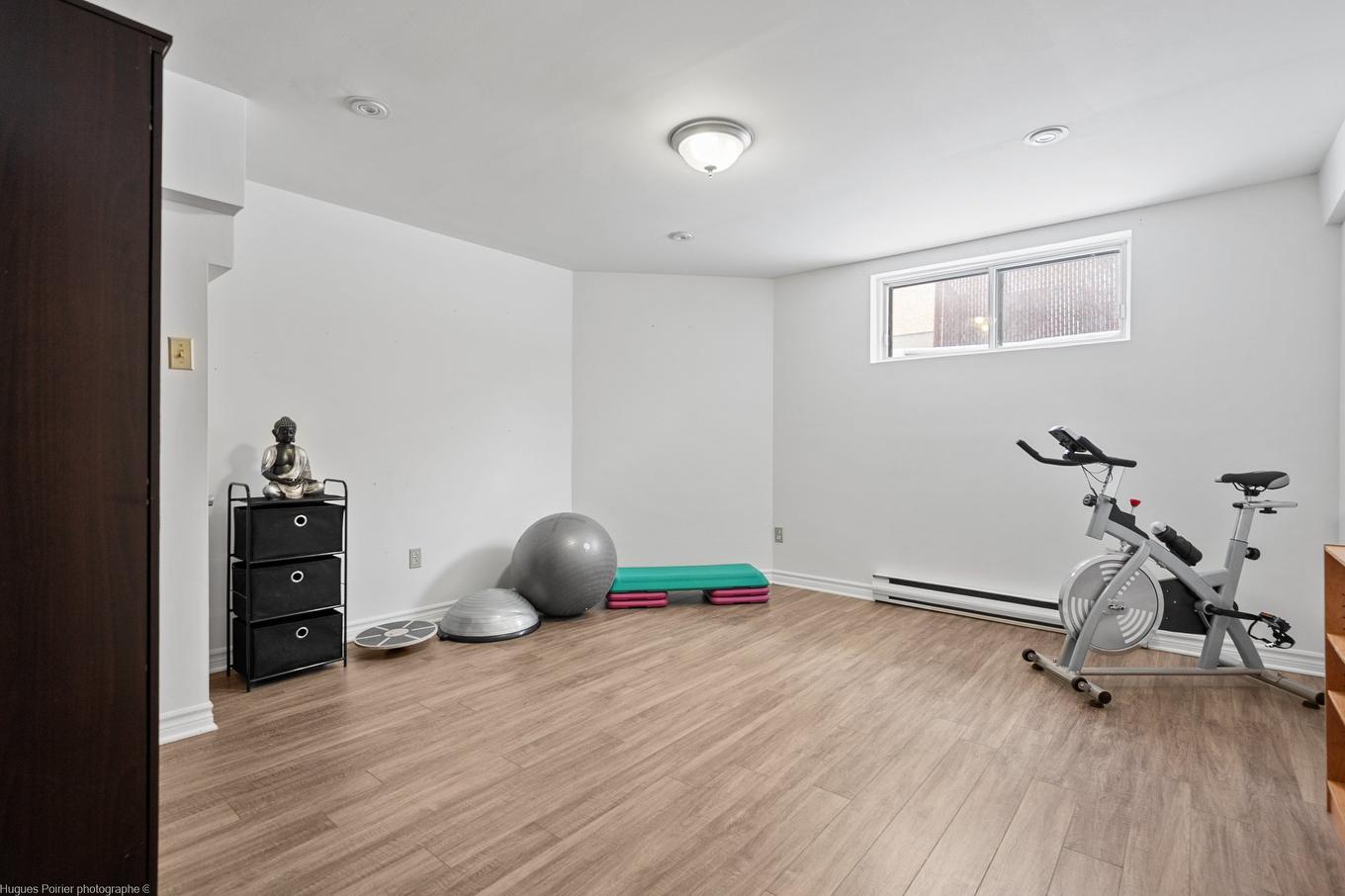 Basement - 938 Rue Jean-Pierre-Meunier, Terrebonne (Terrebonne), QC - Indoor Photo Showing Gym Room