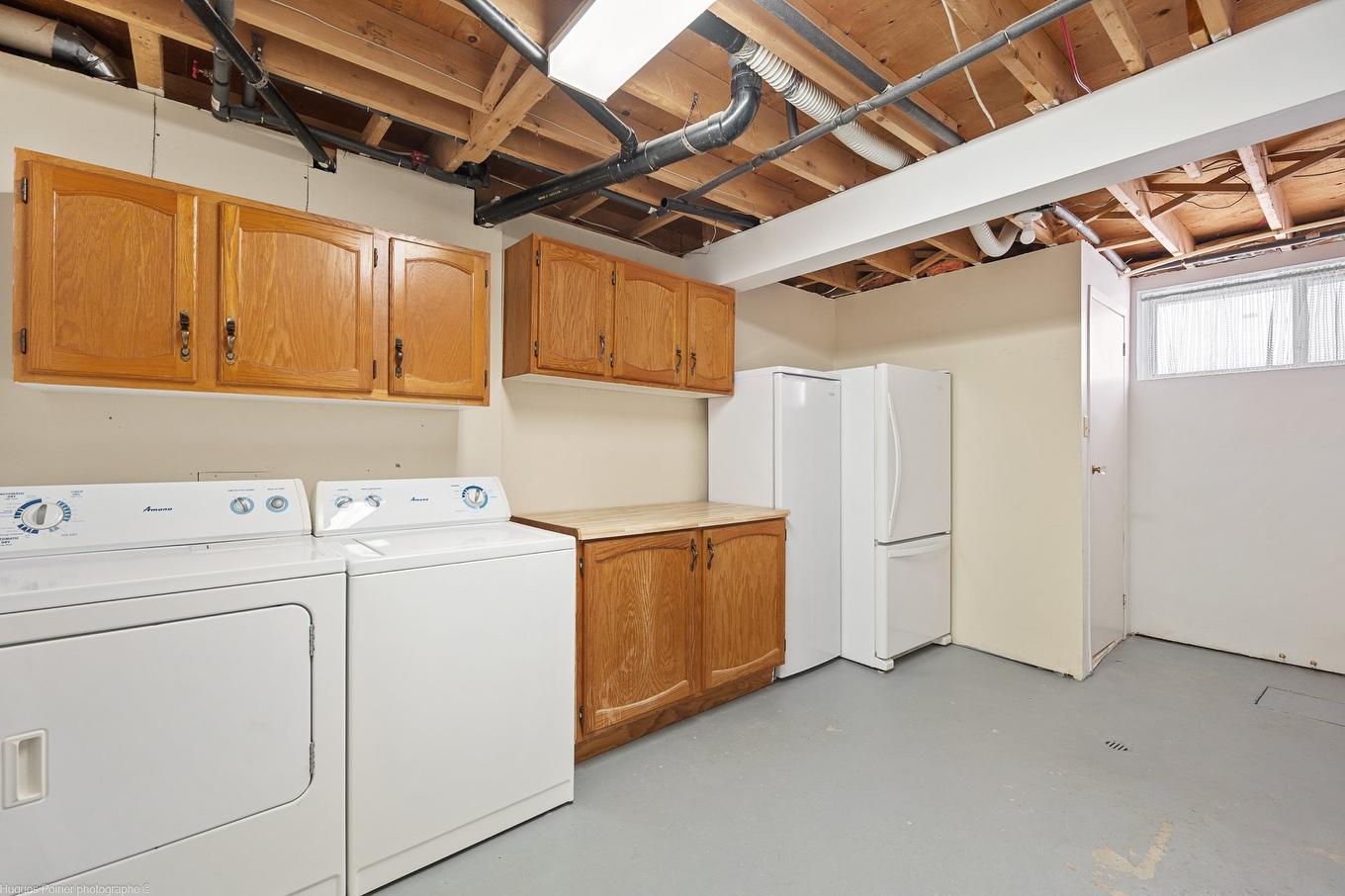 Basement - 938 Rue Jean-Pierre-Meunier, Terrebonne (Terrebonne), QC - Indoor Photo Showing Laundry Room
