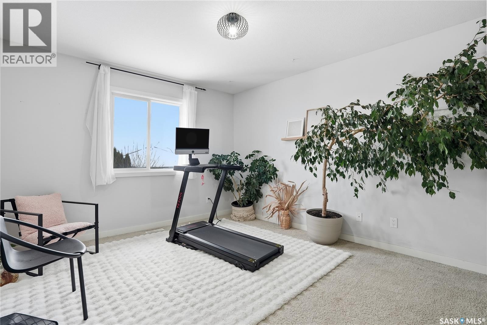 319 East Hampton Boulevard, Saskatoon, SK - Indoor Photo Showing Gym Room