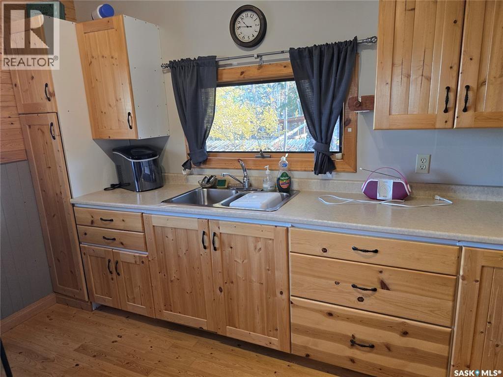 207 Pine Drive, Tobin Lake, SK - Indoor Photo Showing Kitchen With Double Sink