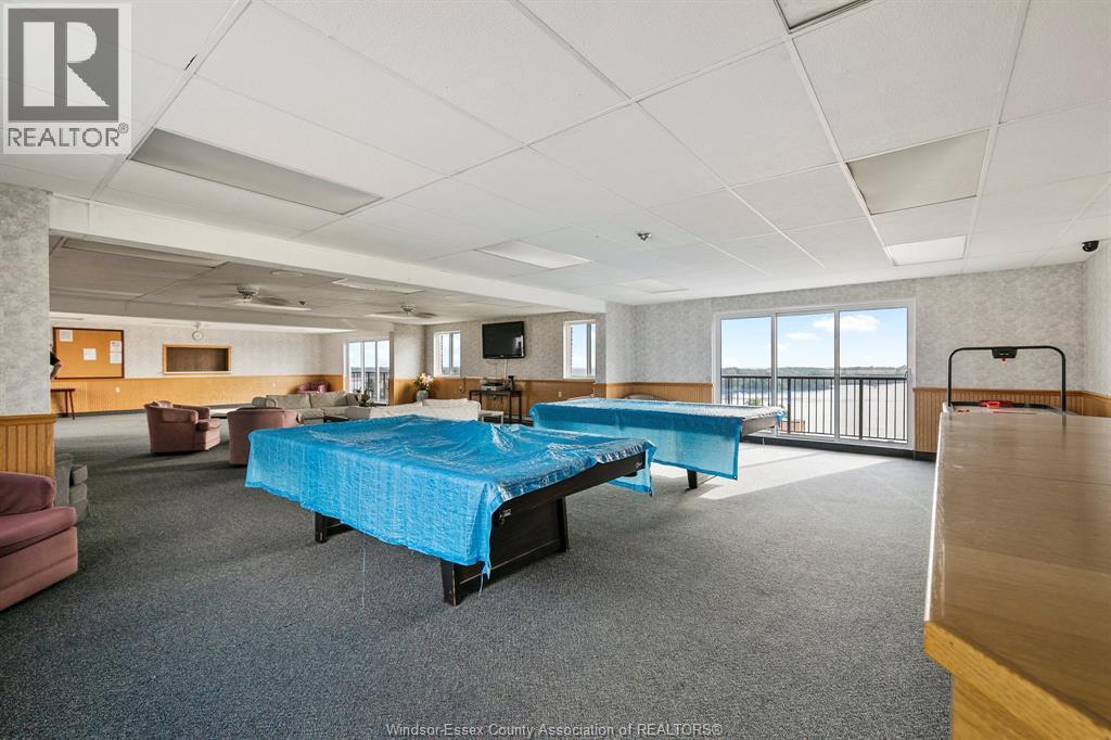 8591 Riverside Dr. E. Unit# 802, Windsor, ON - Indoor Photo Showing Other Room With In Ground Pool