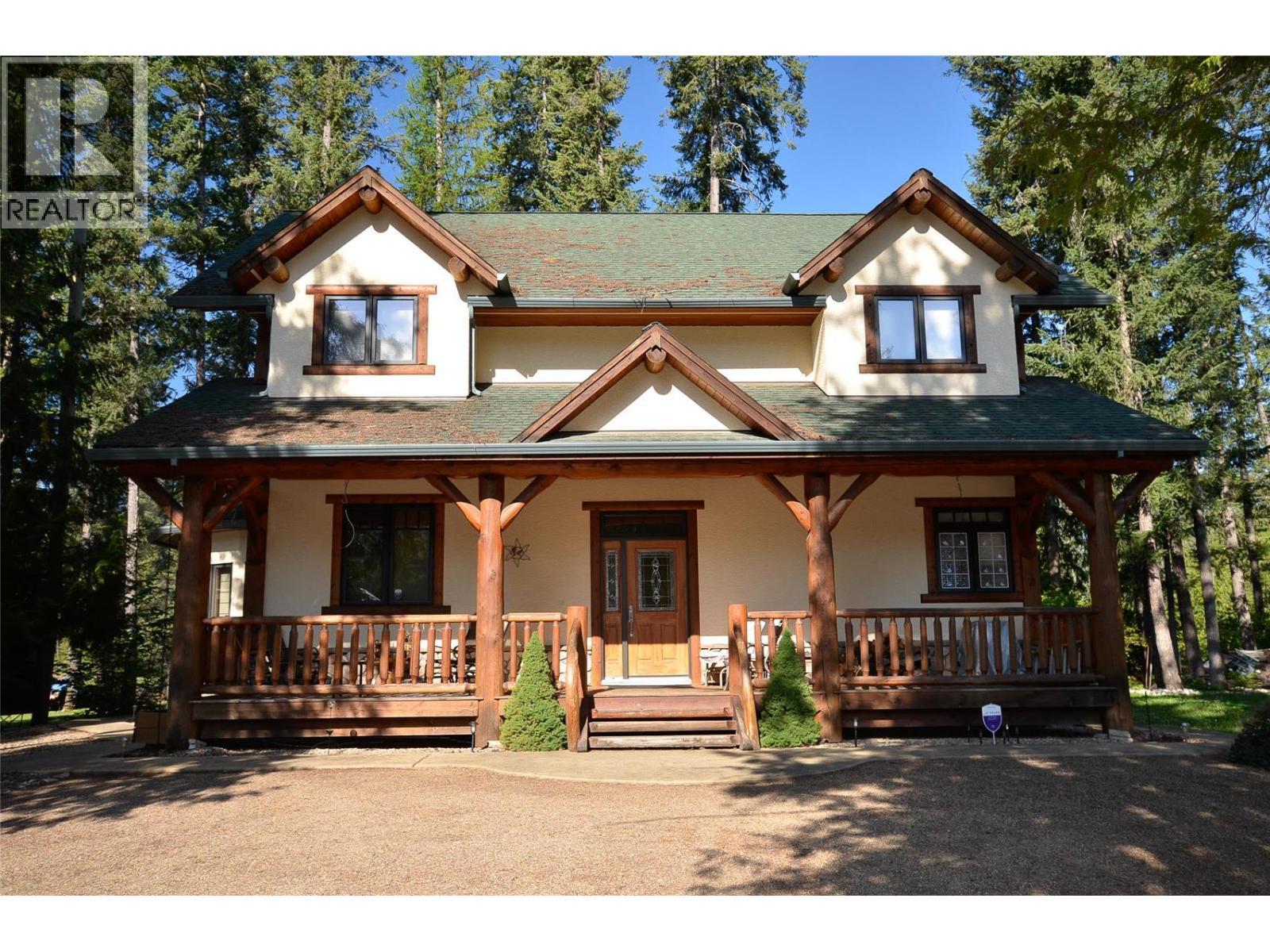 Nice entry drive with full RV hookup for visitors! - 19-3453 Cessna Road, Enderby, BC - Outdoor With Deck Patio Veranda With Facade