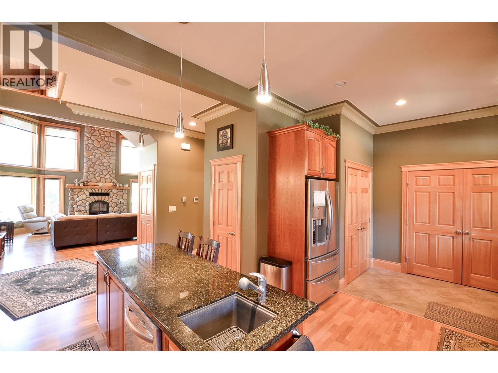 You'll always be included even in the kitchen. - 19-3453 Cessna Road, Enderby, BC - Indoor