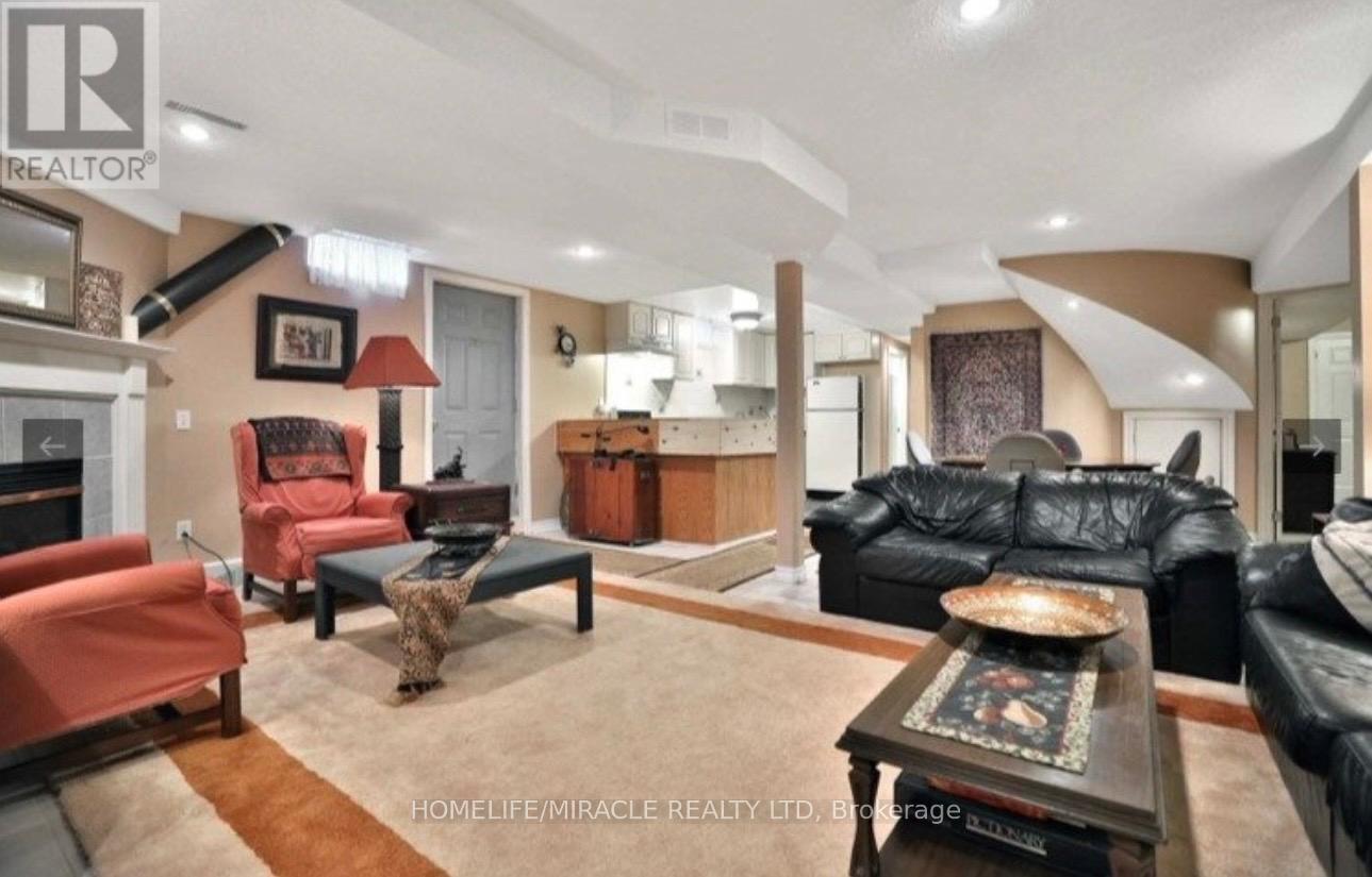 2999 Valcourt Crescent, Mississauga, ON - Indoor Photo Showing Living Room With Fireplace