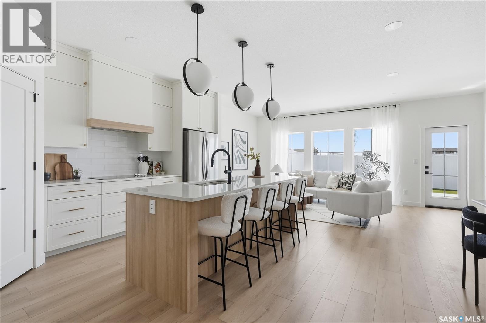 24 720 Brighton Boulevard, Saskatoon, SK - Indoor Photo Showing Kitchen With Upgraded Kitchen