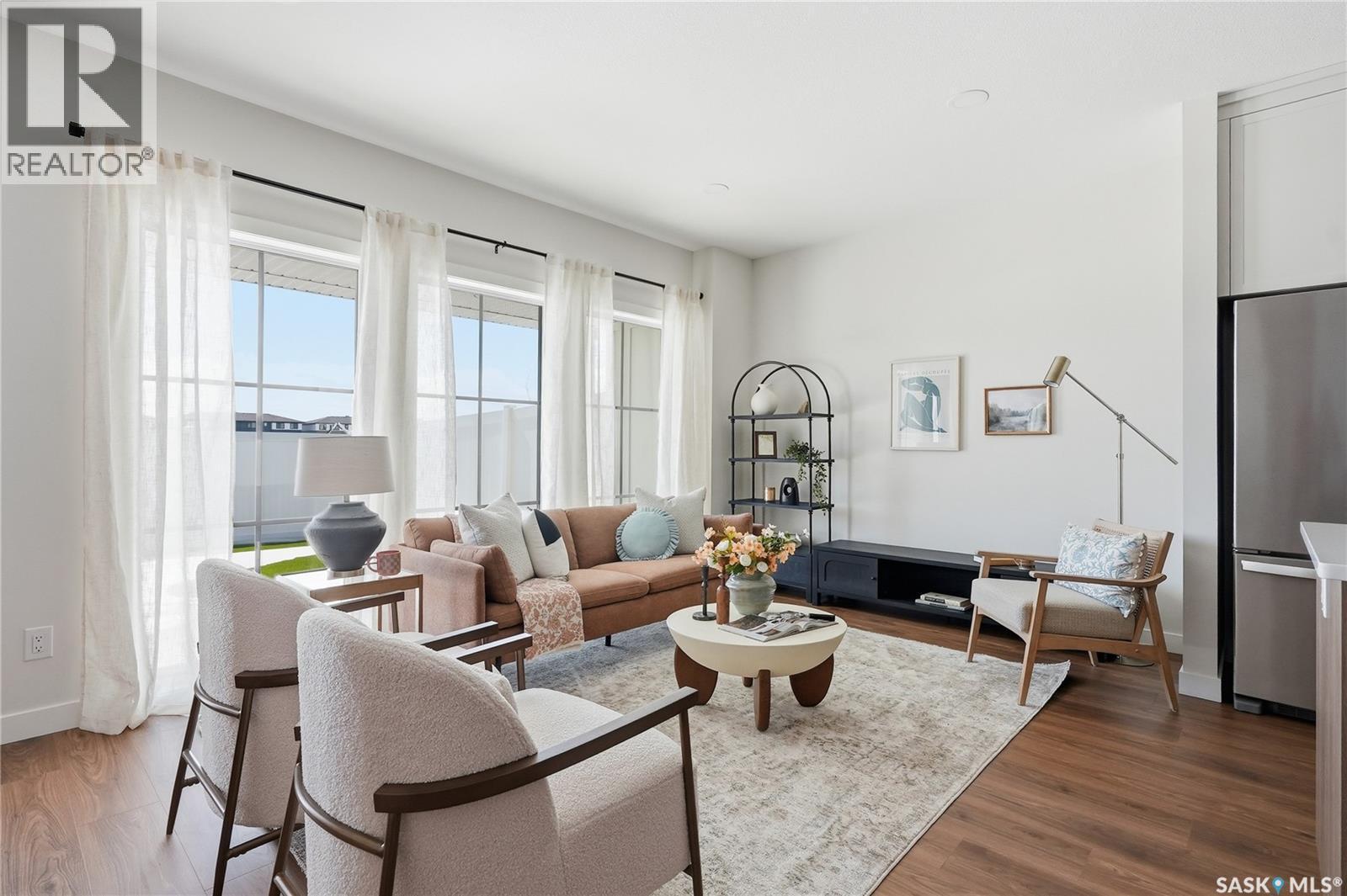 22 720 Brighton Boulevard, Saskatoon, SK - Indoor Photo Showing Living Room