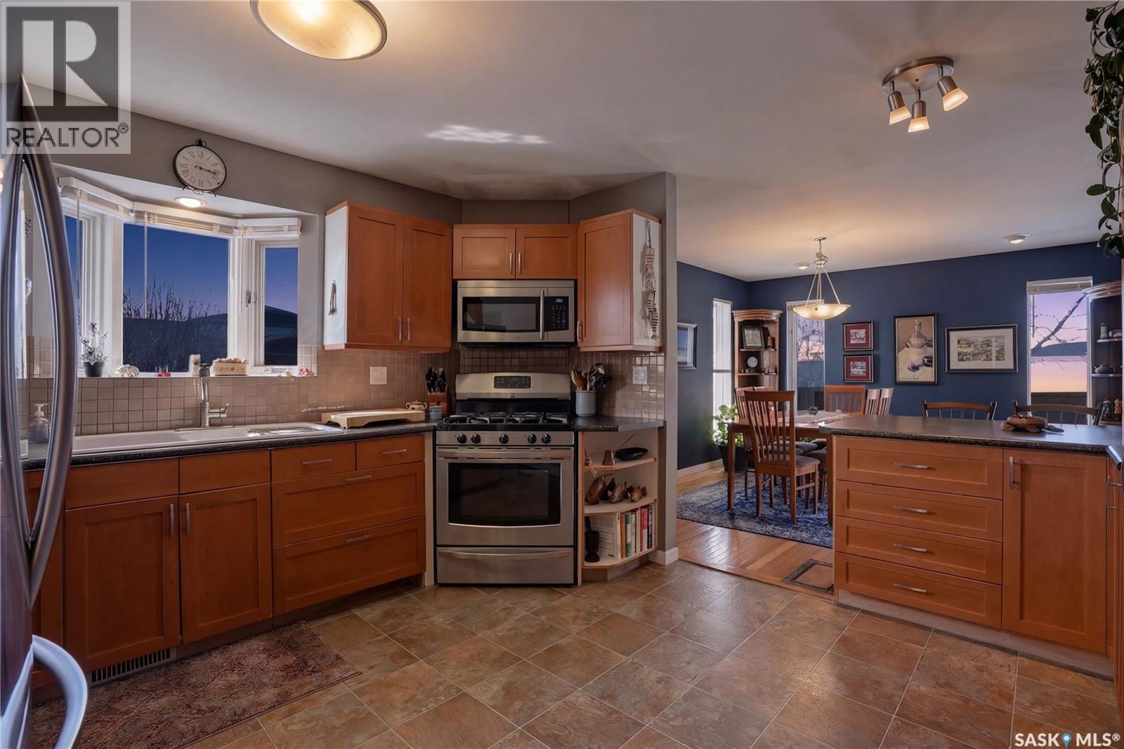 250 Bornstein Court, Saskatoon, SK - Indoor Photo Showing Kitchen With Double Sink
