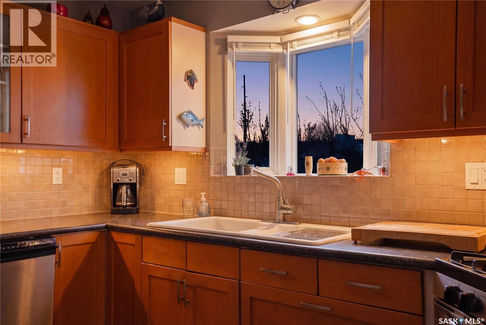 250 Bornstein Court, Saskatoon, SK - Indoor Photo Showing Kitchen With Double Sink