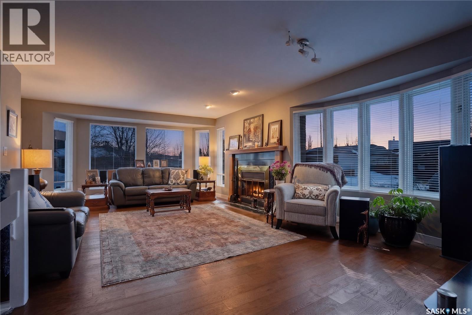 250 Bornstein Court, Saskatoon, SK - Indoor Photo Showing Living Room With Fireplace