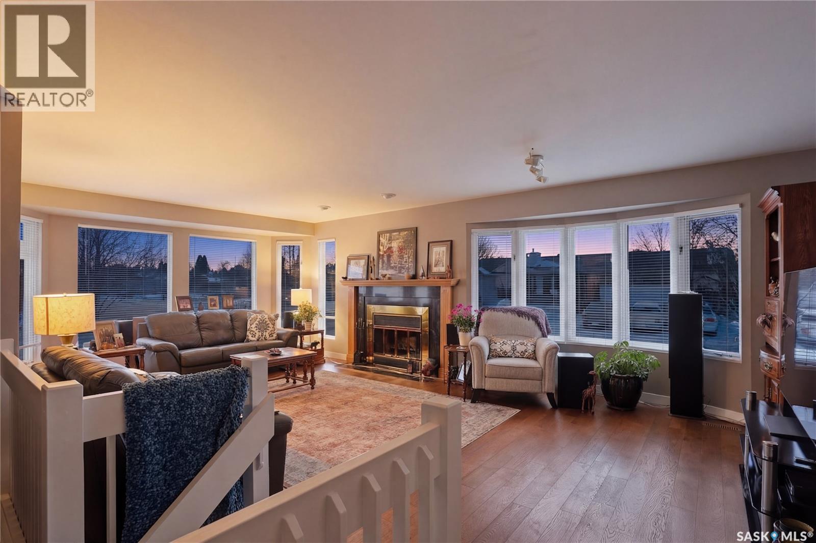 250 Bornstein Court, Saskatoon, SK - Indoor Photo Showing Living Room With Fireplace