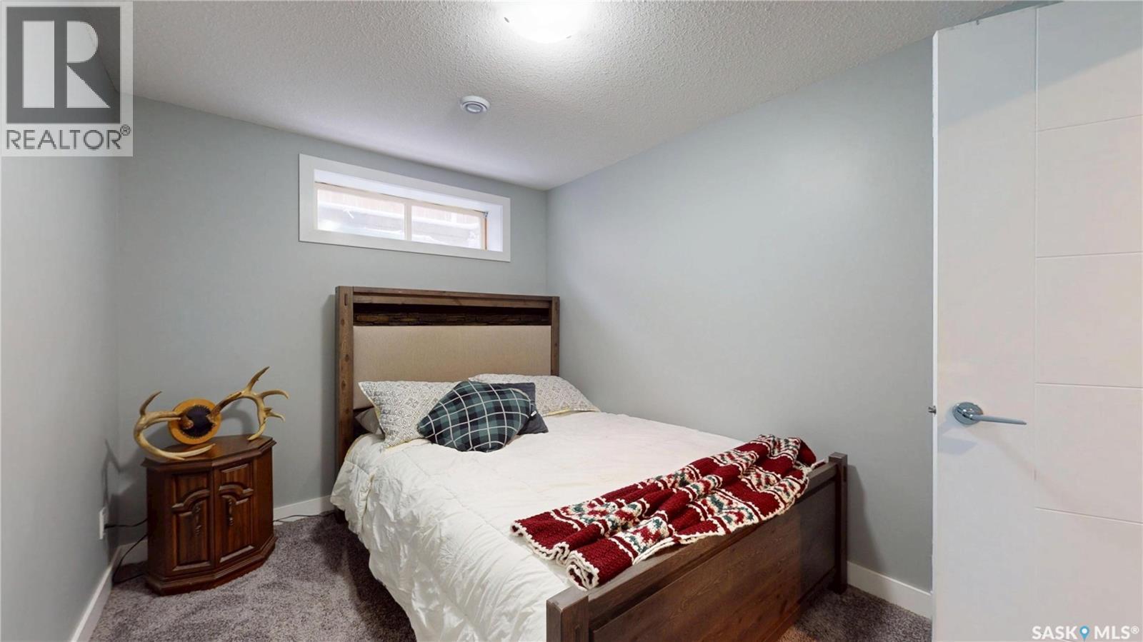 60 Charles Crescent, Regina, SK - Indoor Photo Showing Bedroom