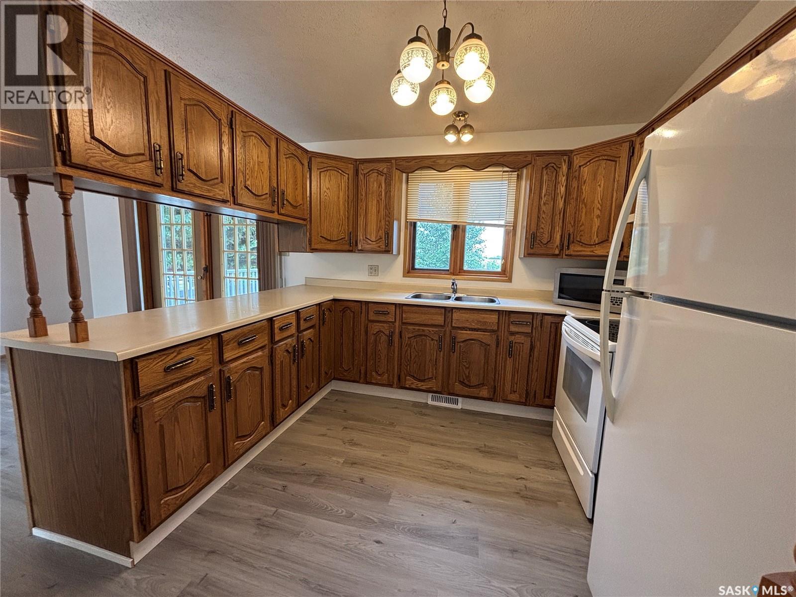 52 Harrigan Crescent, Maple Creek, SK - Indoor Photo Showing Kitchen With Double Sink