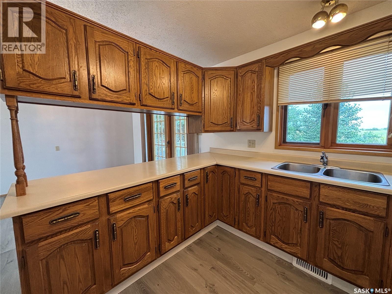 52 Harrigan Crescent, Maple Creek, SK - Indoor Photo Showing Kitchen With Double Sink